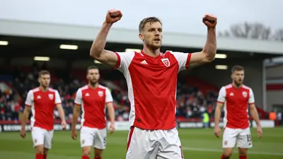 Brackley Town's Duffy leads a comeback victory in the National League North, securing a crucial win for Macclesfield Town